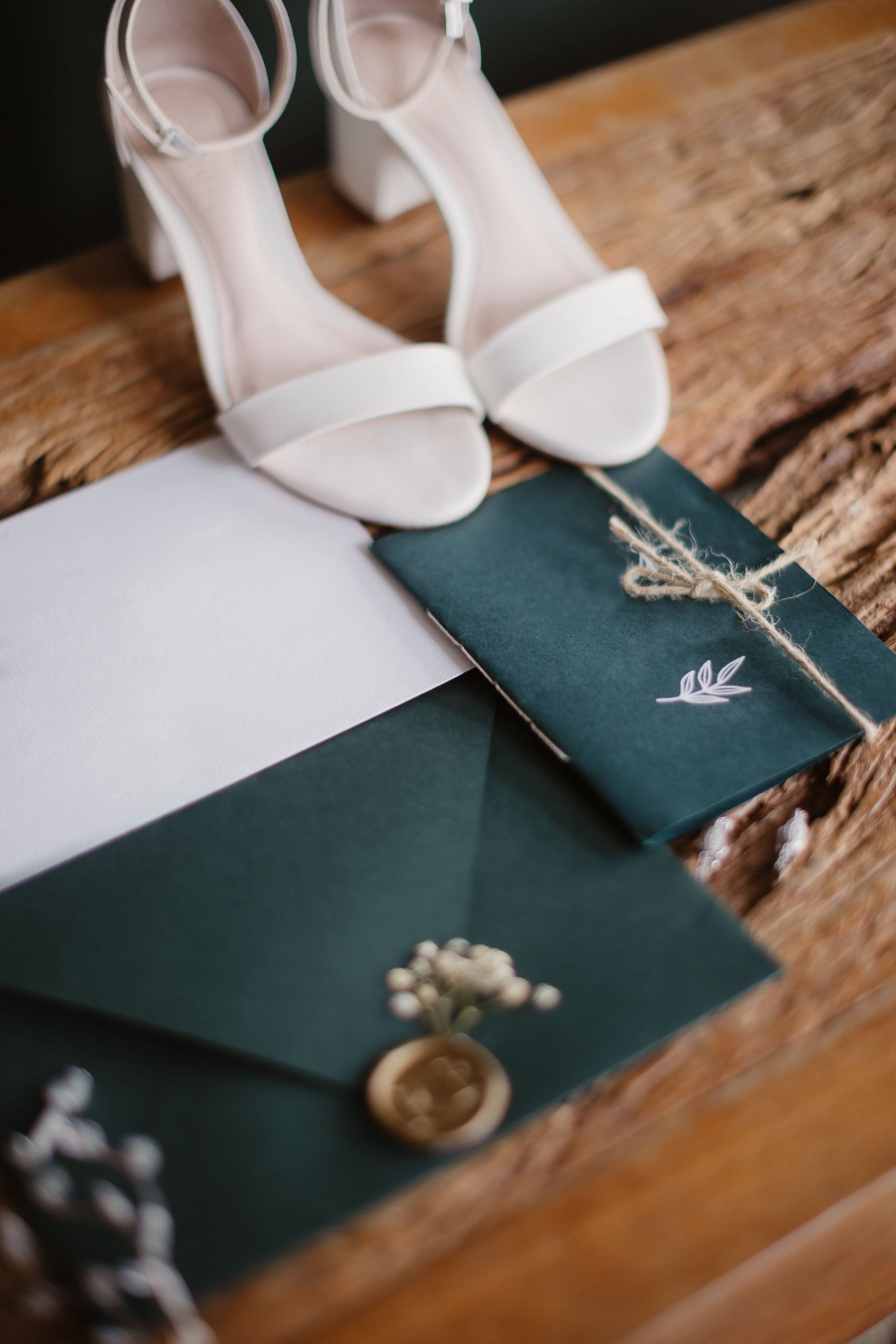 Elegant wedding invitations with bridal shoes