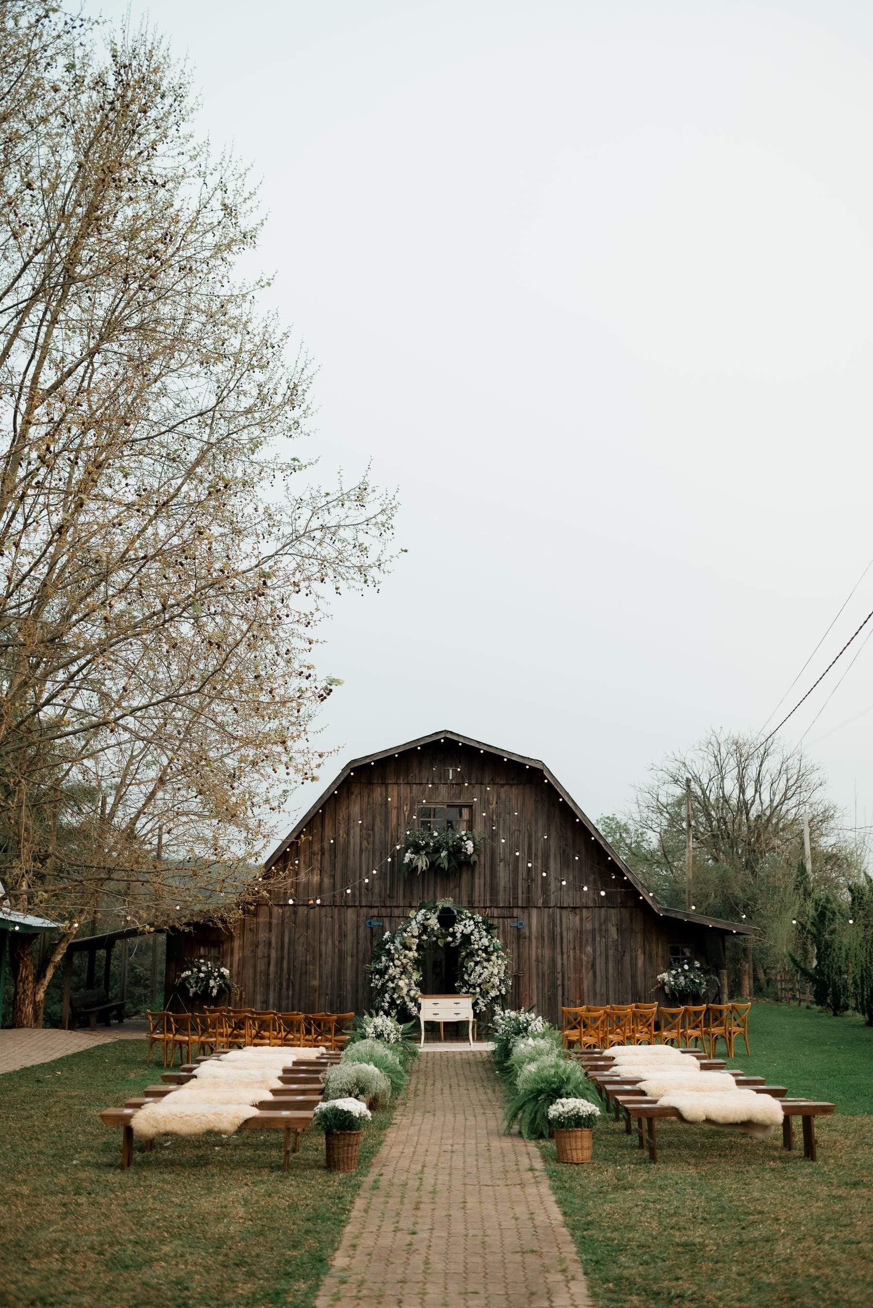 Beautiful outdoor rustic barn wedding venue setup