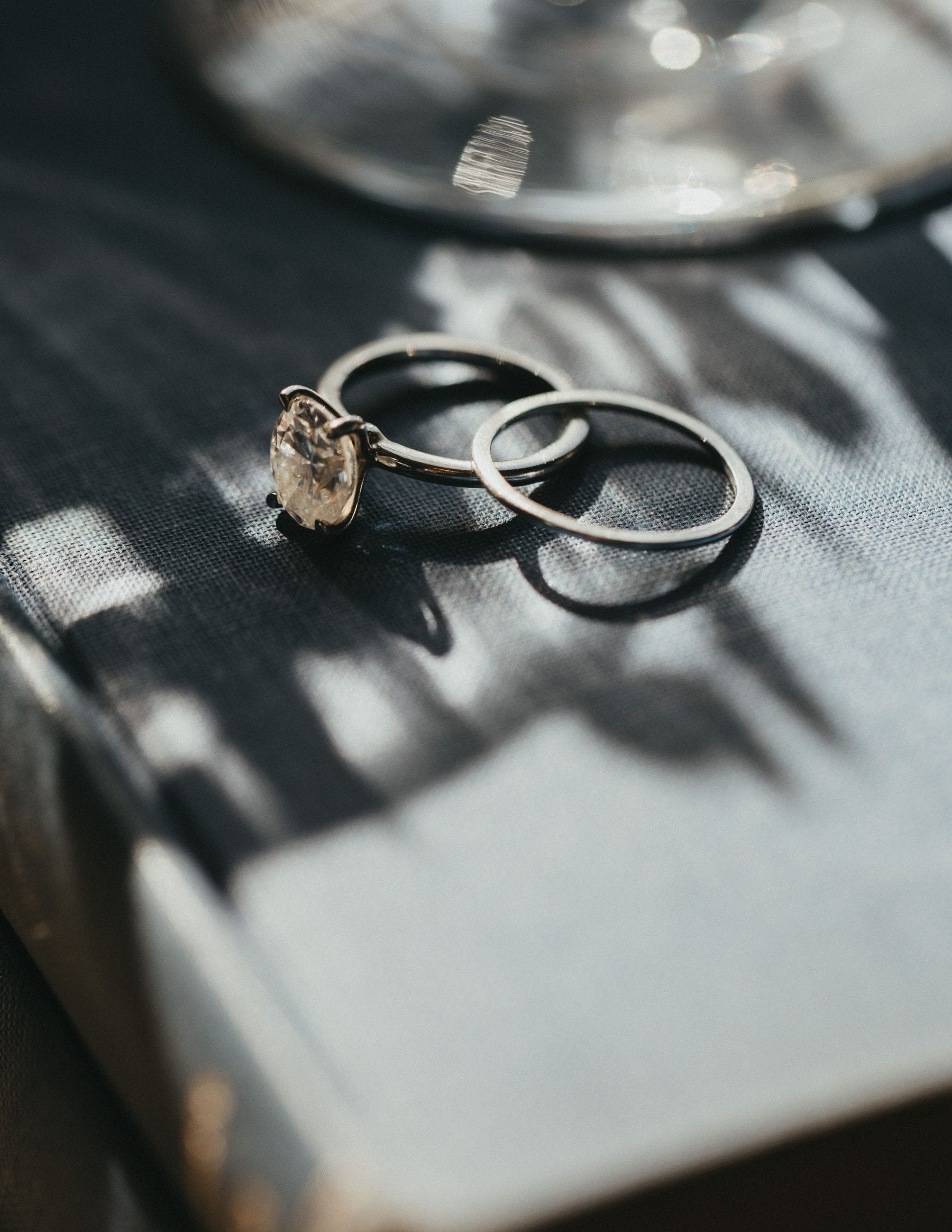 Elegant engagement rings on vintage book